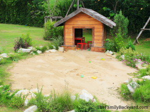 Sandpit with playhouse